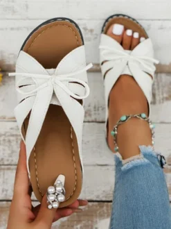 Casual Bowknot Hollow Out PU Comfy Wedge Heel Slide Sandals 33 Casual Bowknot Hollow Out PU Comfy Wedge Heel Slide Sandals -Zolucky Sales Store 59d4d2d7549b0cac3eee17abf58d0117